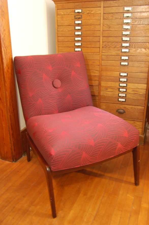 Red armless chair